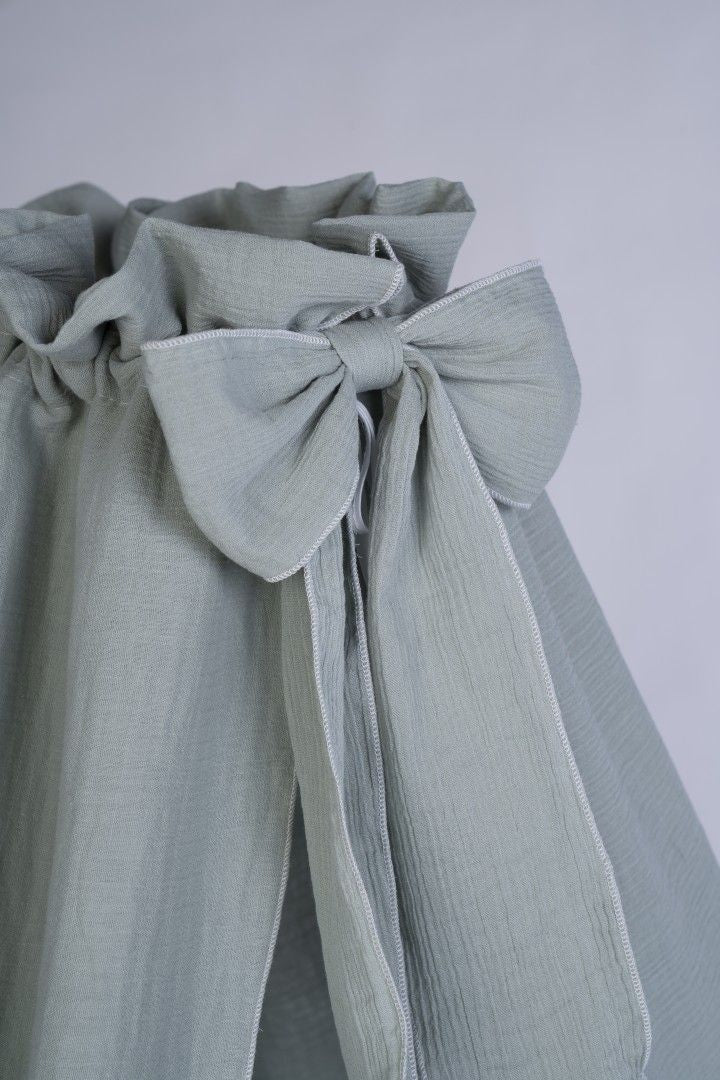 Taupe Stubenwagen with soft muslin fabric and decorative bow detail. - Mionido - Bollerwagen Tony (natur)
